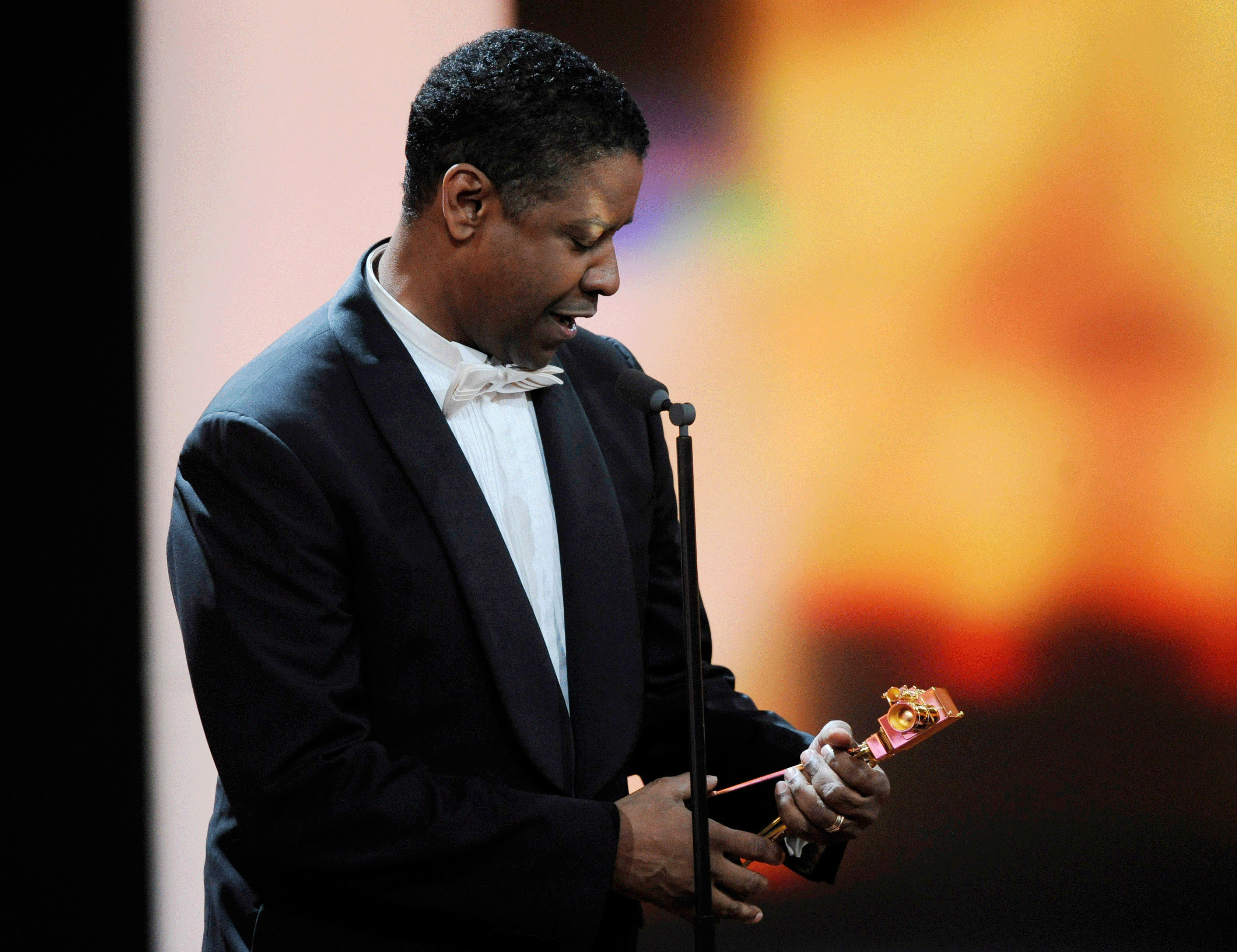 Actor Denzel Washington holds his trophy for  Best International Actor during the 47th Golden Camera award ceremony in Berlin on  Feb 4, 2012.  