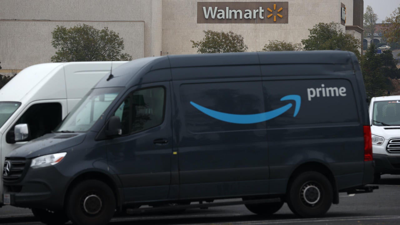 amazon prime truck in front of walmart store 