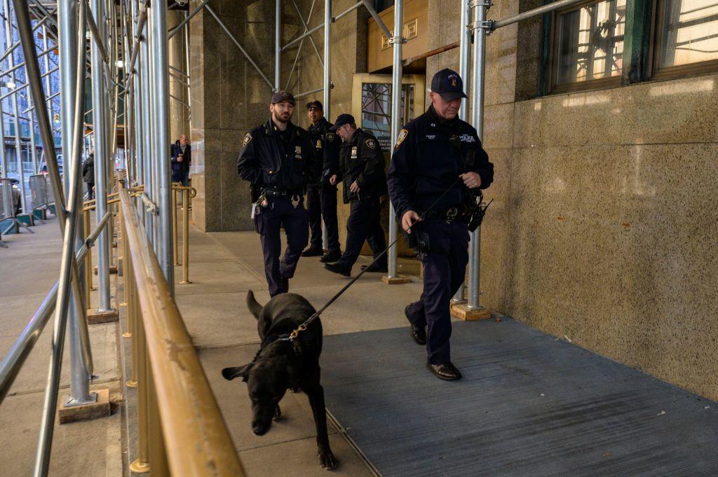 A NYPD K-9 Unit conducts a security sweep outside the Manhattan Criminal Court on March 29, 2023 in New York City. 