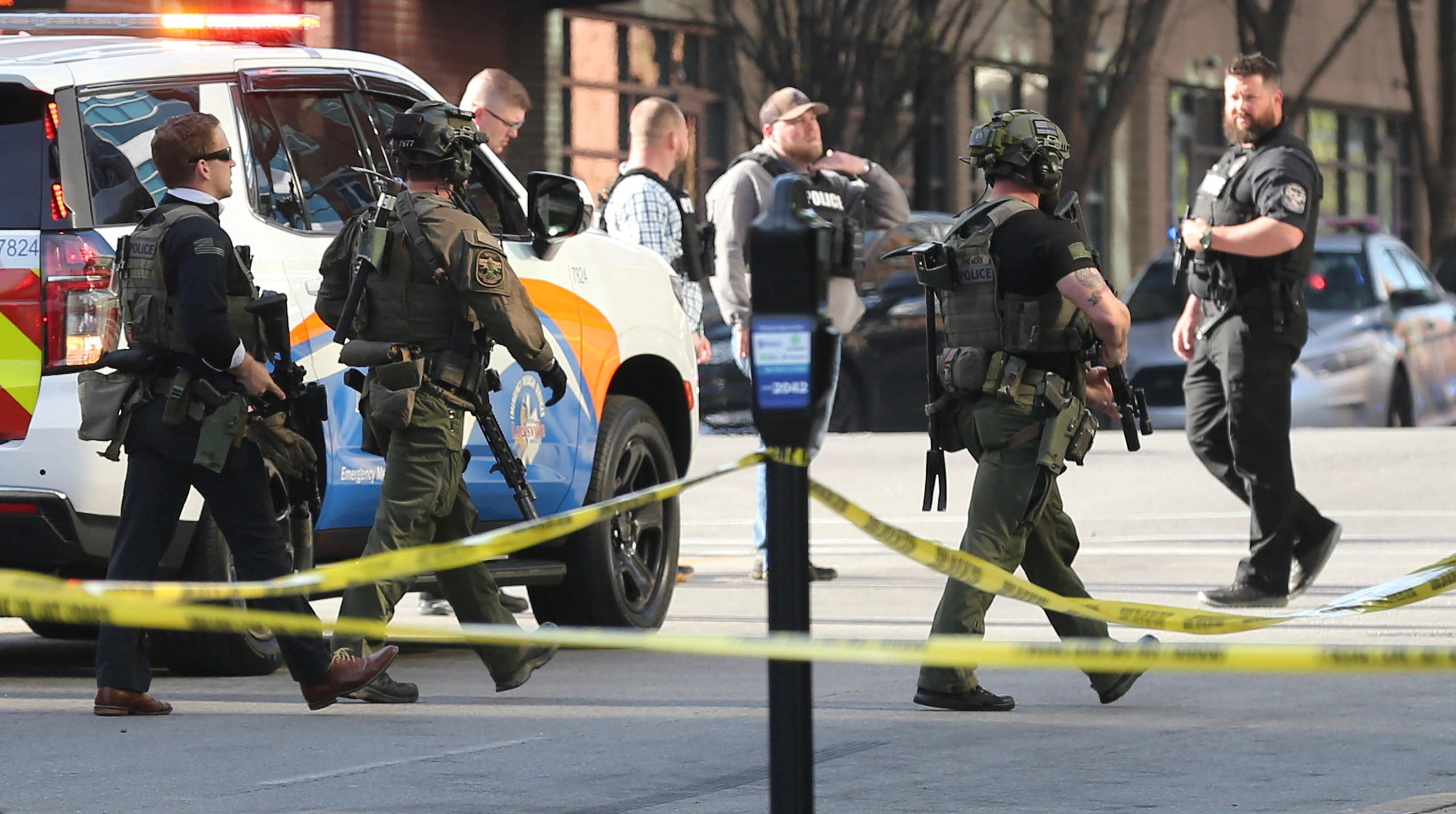 Police deploy at the scene of a mass shooting near Slugger Field baseball stadium in downtown Louisville 