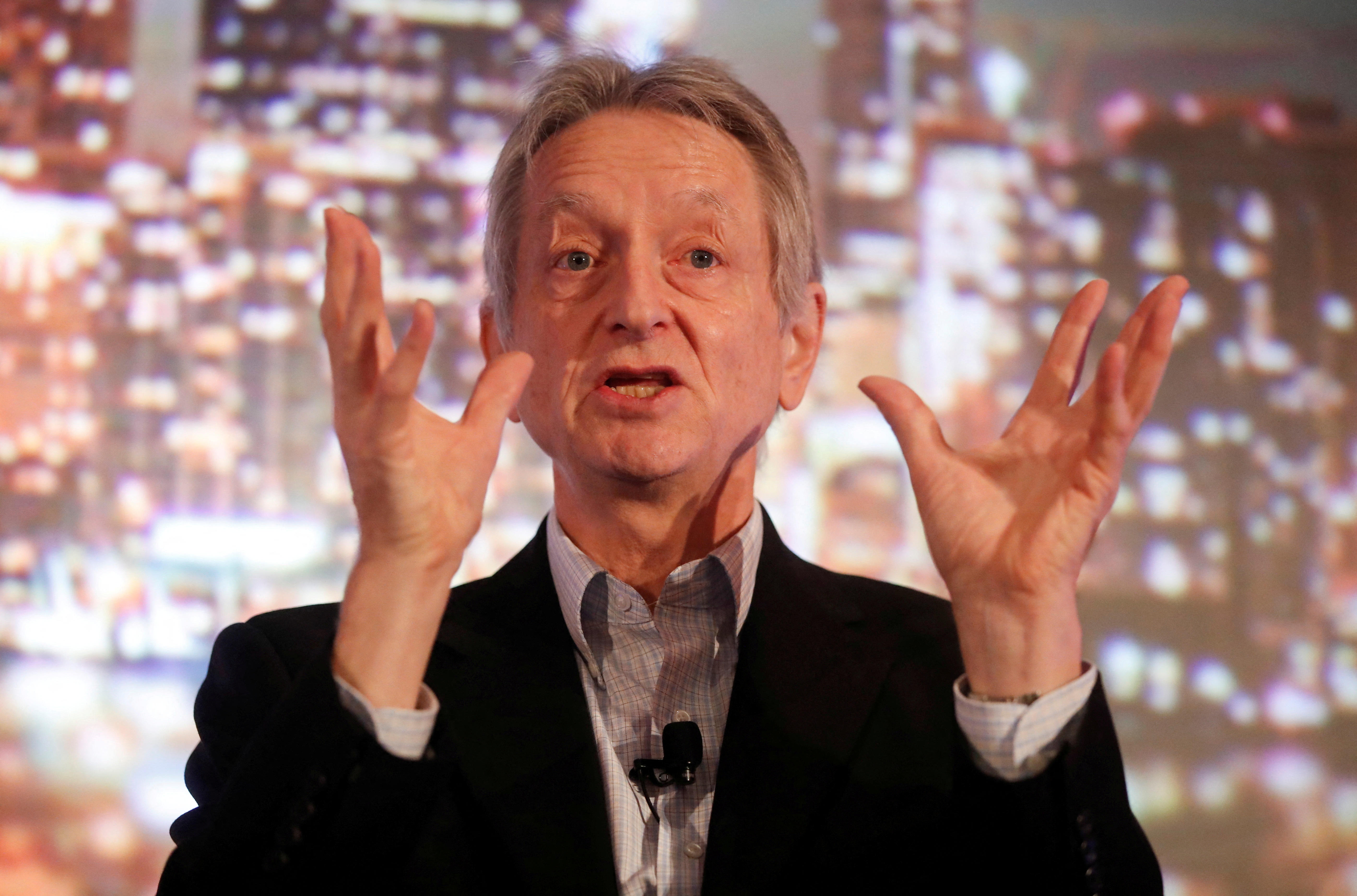 FILE PHOTO: Artificial intelligence pioneer Geoffrey Hinton speaks at the Thomson Reuters Financial and Risk Summit in Toronto 