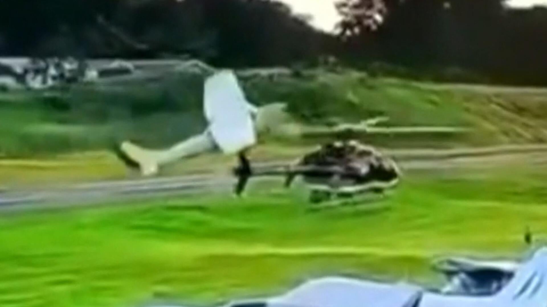 Pilot killed as plane collides with police helicopter at airport, officials say