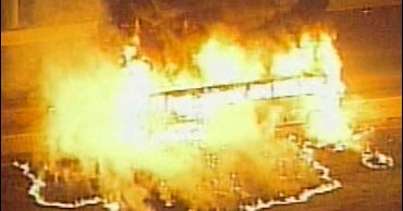 Evacuee Bus Bursts Into Flames - CBS News