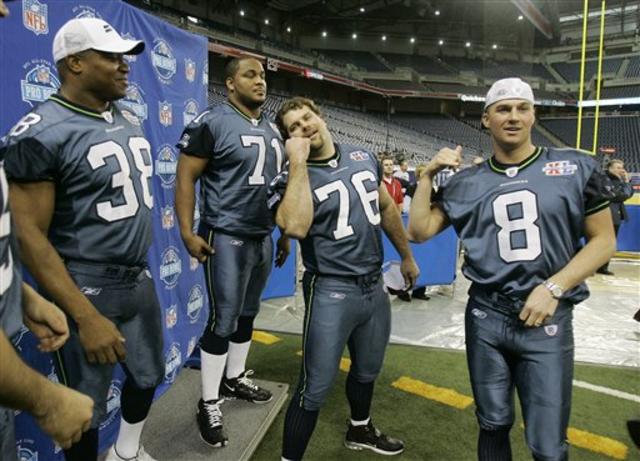 Seattle Seahawks cornerback Michael Harden (25) hugs teammate and defensive  lineman Rodney Bailey during Super Bowl XL Media Day at Ford Field in  Detroit Tuesday, Jan. 31, 2006. Super Bowl XL will