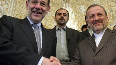 Javier Solana and Manouchehr Mottaki 