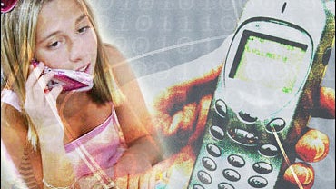 Teenager uses cell phone 