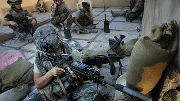GI searches for sniper who fired on Iraqi home in Ramadi, 6-20-06 