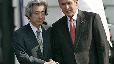 President Bush shakes hands with Japanese Prime Minister Junichiro Koizumi 