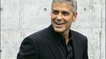 George Clooney at  Armani fashion show 