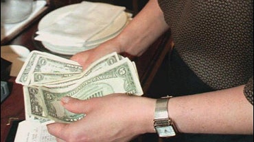 Waitress counting tips, 5-17-96 