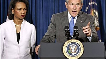 President Bush gestures during a news conference with Secretary of State Condoleezza Rice 