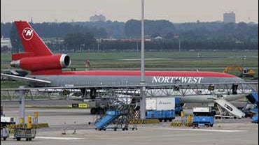 The Northwest Airlines DC10 that was escorted back to Amsterdam's Schiphol Airport, Wed., Aug. 23, 2006. 