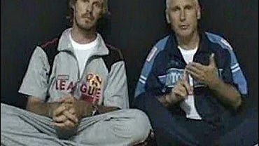 American Steve Centanni, right, and New Zealand cameraman Olaf Wiig as they make a statement while in captivity at an undisclosed location in the Gaza Strip. 