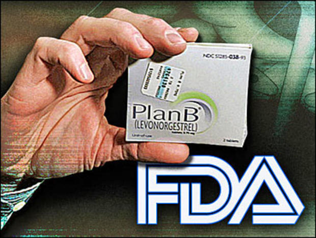 Pharmacist holds package of "Plan B" emergency contraceptive tablets 