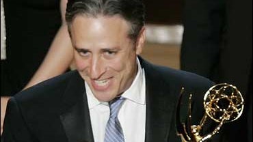 Jon Stewart accepts an Emmy on Aug. 27 