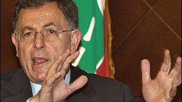 Lebanon's Prime Minister Fuad Saniora, gestures while speaking at a press conference at the Government House 