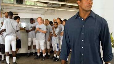 Wrestler turned actor Dwayne Johnson - aka The Rock - is shown in a scene from the movie, "Gridiron Gang." 