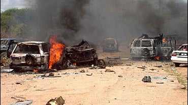 Cars burn after an explosion in Baidoa, Somalia, the only town controlled by the government 