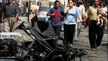 woman at scene of car bombing 