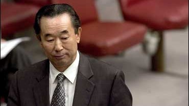 North Korean Ambassador to the United Nations Pak Gil Yon walks out of the Security Council meeting after it voted in favor of the resolution for sanctions against North Korea. 