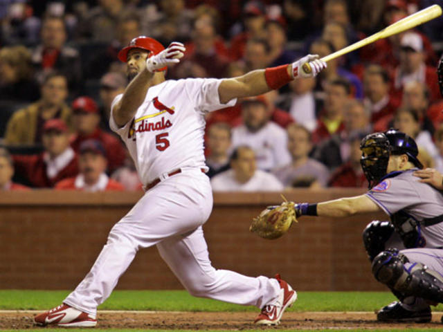 St. Louis Cardinals' So Taguchi watches his RBI-single in the