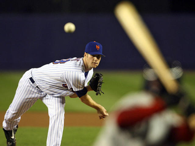 Carlos Delgado homers twice, backs Johan Santana as Mets