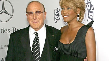Clive Davis (L) and singer Whitney Houston 
