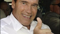 California Gov. Arnold Schwarzenegger gives the thumbs up to supporters after his visit to Victory 06 volunteer headquarters on Monday, Nov. 6, 2006, in Los Angeles. (AP Photo/Nick Ut) 