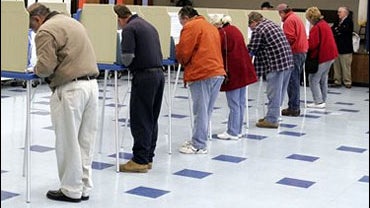 Voters fill every booth as they cast ballots in Exeter, R.I. on Tuesday, Nov. 7, 2006. 