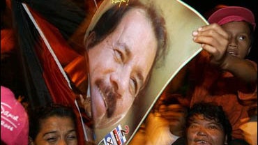 Supporters of Nicaraguan presidential candidate Daniel Ortega celebrate in the streets of Managua, Nicaragua, Nov. 7, 2006. 