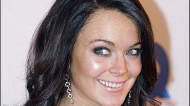 Lindsay Lohan arrives at the GQ magazine 2006 Men of the Year dinner 