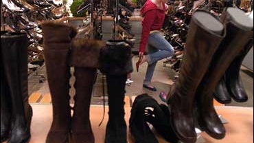 Trying on some early-morning bargains 