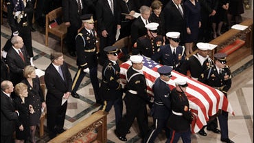 Ford is carried by a military honor guard during a State Funeral Service at the Washington National Cathedral in Washington, Tuesday, Jan. 2, 2007. 