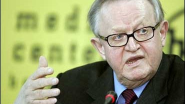 U.N. envoy Martti Ahtisaari gestures as he speaks during a press conference, after talks with Serbian President Boris Tadic, in Belgrade, Serbia, Friday, Feb. 2, 2007. 