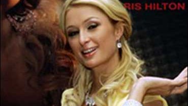 Paris Hilton presents her ball robe for the traditional Viennese Opera Ball, on Thursday, Feb. 15, 2007, at the hotel Hilton in Vienna. Hilton was in Vienna to attend the city's prestigious Opera Ball as Lugner's special guest. The 74-year-old married con 