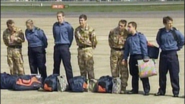 The British sailors and marines held captive for nearly two weeks, board an awaiting Royal Navy helicopter after arriving at London's Heathrow airport 
