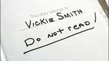 Anna Nicole Smith's diary is shown in Dallas, Thursday, April 5, 2007. The starlet's two journals are among several pieces of Smith memorabilia going up for public auction in a few weeks. Two handwritten diaries penned in the early 1990s reveal a troubled 