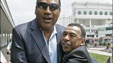 O.J. Simpson and Angel Cordero Jr. 