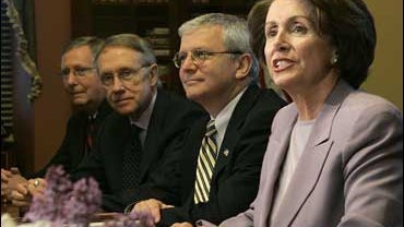 House Speaker Nancy Pelosi, right, makes a statement at the top of  Capitol Hill meeting on Iraq, Friday, May 18, 2007. 