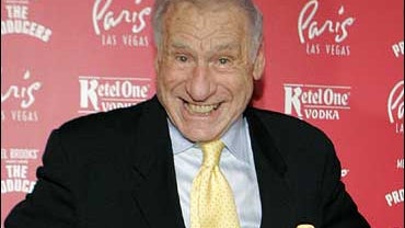 Producer-actor Mel Brooks poses for photos as he arrives at the grand opening of the musical comedy "The Producers" at the Paris hotel-casino in Las Vegas on Friday, Feb. 9, 2007. 