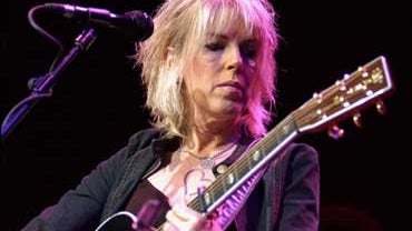 Singer Lucinda Williams performs at the Olympia Theatre May 8, 2003 in Dublin, Ireland. 