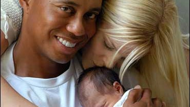 Tiger Woods, Elin Woods, and their daughter Sam 