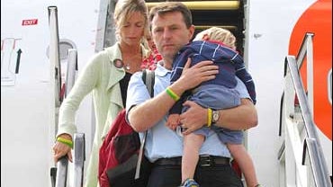 Kate and Gerry McCann arrive at East Midlands airport in England 