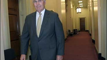 Sen. Larry Craig, R-Idaho walks on Capitol Hill in Washington, Tuesday, Sept. 18, 2008 
