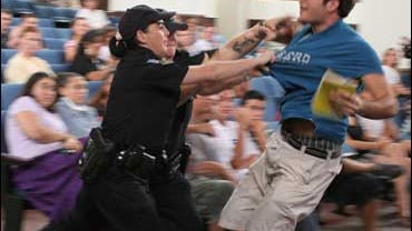 University of Florida student Andrew Meyer struggles with University Police as officers try to remove him from a question and answer session with Sen. John Kerry, D-Mass., Monday, Sept. 17, 2007, in Gainesville, Fla. 