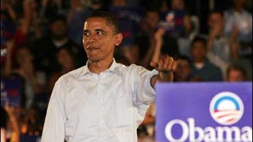 Democratic presidential hopeful, U.S. Sen. Barack Obama D-Ill., is greeted as he campaigns in Portland, Maine, on Tuesday, Sept. 25, 2007. (AP photo/Pat Wellenbach) 
