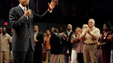 Democratic Presidential hopeful Sen. Barack Obama, D-IL, attends Redemption World Outreach Center Sunday, Oct. 7, 2007, in Greenville, S.C. Obama spoke to the church's more than 4,000 members during services Sunday morning. (AP Photo/Mary Ann Chastain) 
