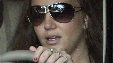 Singer Britney Spears, right, drives from L.A. Superior court 