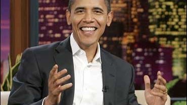 Democratic presidential hopeful U.S. Sen Barack Obama, D-Ill., and host Jay Leno (unseen) chat during the taping of "The Tonight Show With Jay Leno" at NBC studios in Burbank, Calif., Wednesday, Oct. 17, 2007. (AP Photo/Reed Saxon) 