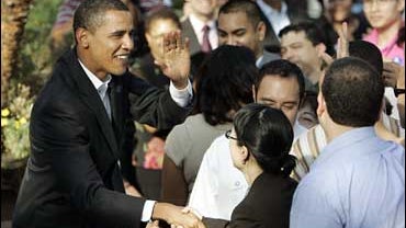 Presidential hopeful Sen. Barack Obama, D-Ill., shakes hands as he leaves a Town Hall event at Garfield High School in Los Angeles' Eastside Saturday, Oct. 20, 2007. Obama called for better education during a campaign stop at the East Los Angeles school i 
